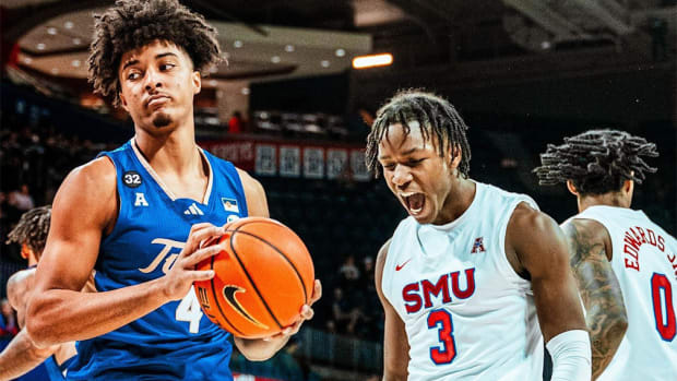The SMU Mustangs' Chuck Harris gets boosted on adrenaline following a shot against Tulsa.